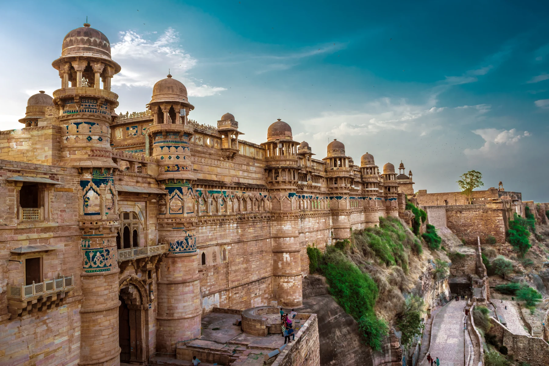 The real Gwalior Fort, decorated palace facade, original stonework and fortified approach