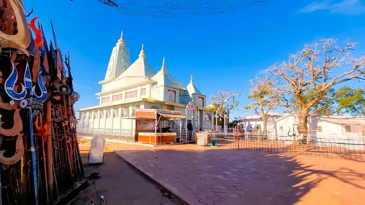 Hilltop temple with offered tridents near Pachmarhi