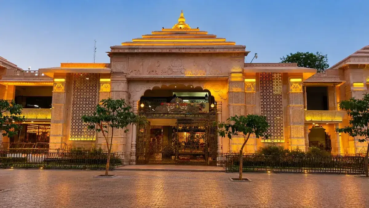 Sandstone entrance hall of Mahakal Lok lit at dusk, Ujjain