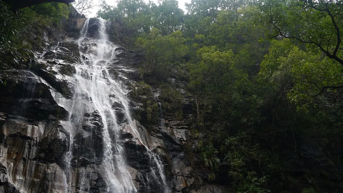 Bee Falls cascading down a rocky slope in Pachmarhi.